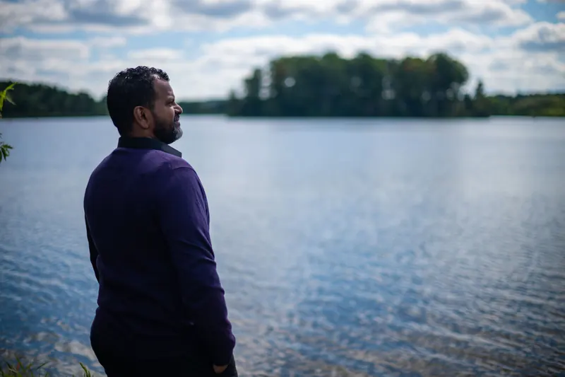 Jeyas Balaskanthan looking out over the Grand River